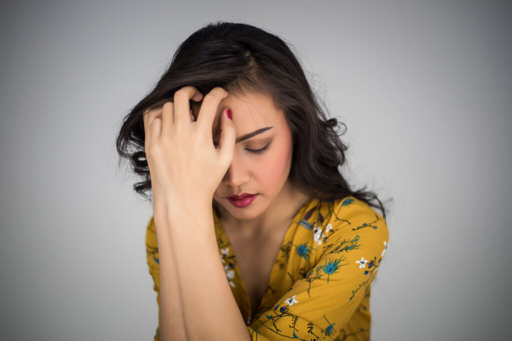 stressed asian woman