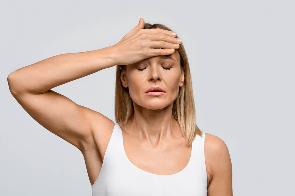 Woman with perimenopause and menopause symptoms