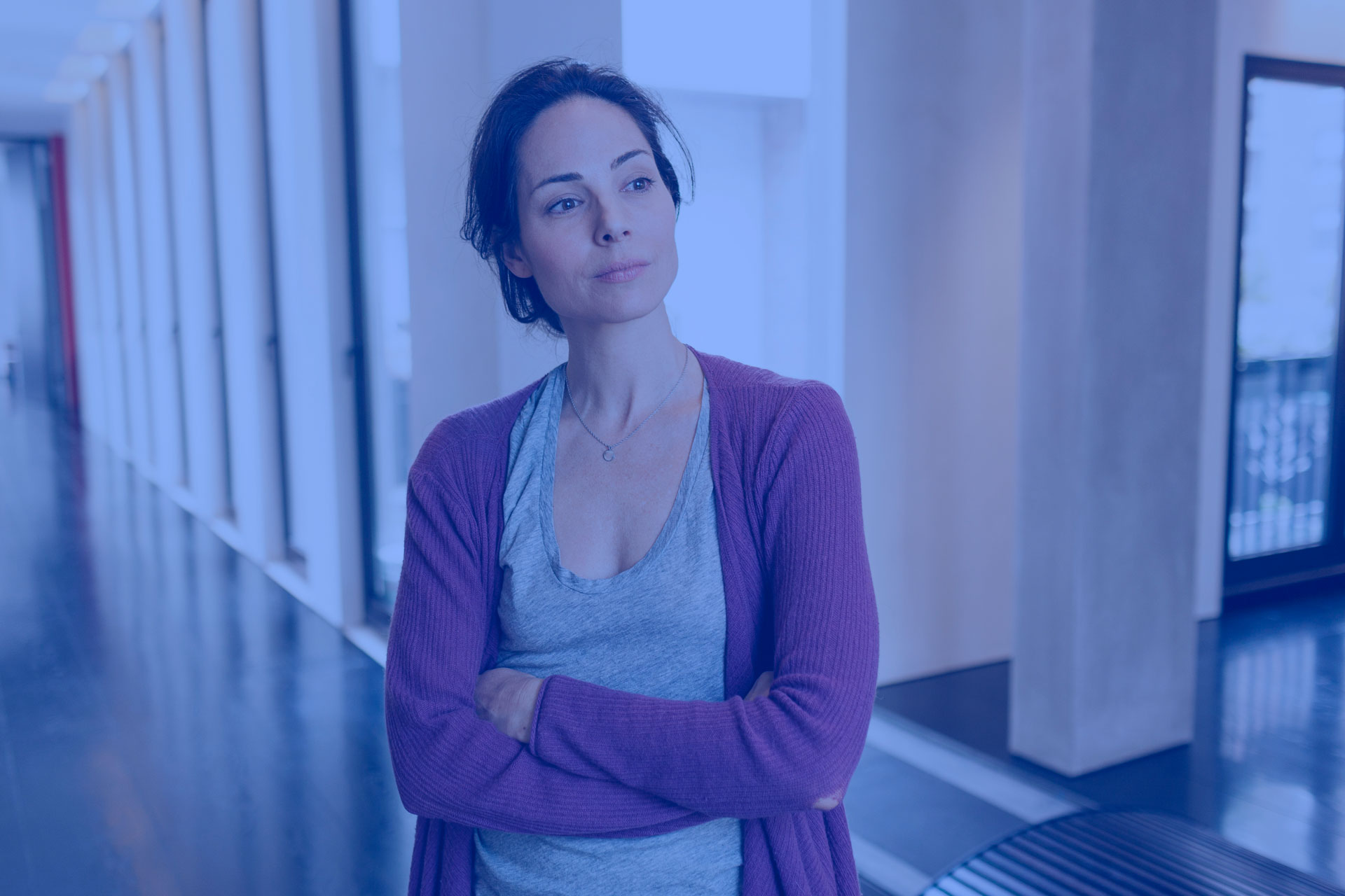 woman standing in hallway